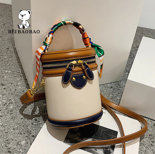 Cylinder PU Messenger Bag